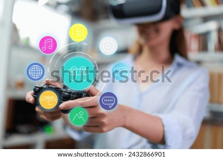 Asian businesswoman using vr virtual reality headset interacting with internet browser window with an application working and entertainment system. Working in an office background.