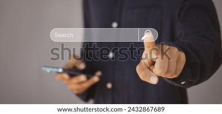 Searching the internet with a search bar working on a smartphone, internet network concept.	