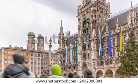 Music show on Clock Tower or Glockenspiel section of bell play timelapse, Munich, Germany. Detail of Rathaus (New Town Hall) with chime in city center. It is landmark located on Marienplatz square Royalty-Free Stock Photo #2432880381