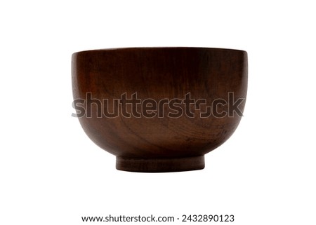 Empty wooden bowl isolated on a white background. 