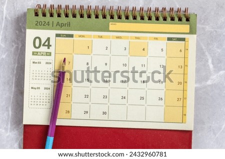 Calendar for April 2024 on a marble background Royalty-Free Stock Photo #2432960781