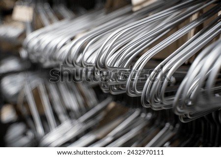 Metal hangers for sale on a rack