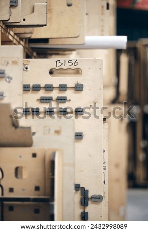 Wooden Flat and Rotary Die Ejection Rubber Installation Rotary Cutting Dies,. Wooden templates for rotary cylinder die ejection. Royalty-Free Stock Photo #2432998089