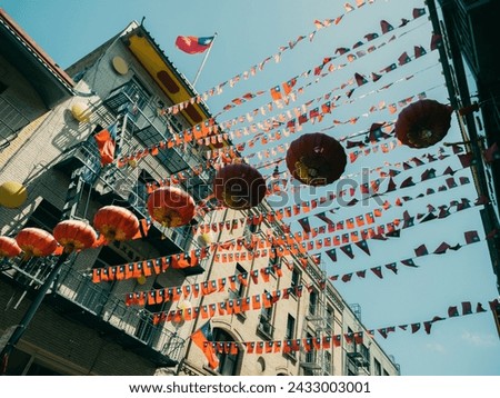 Chinatown is decorated with lanterns, flags of the Republic of China (Taiwan) and USA Royalty-Free Stock Photo #2433003001