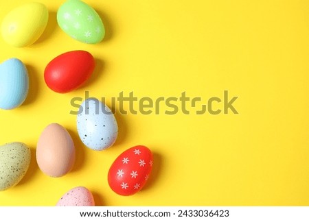 Easter decor concept. Top view photo of easter eggs on color background 