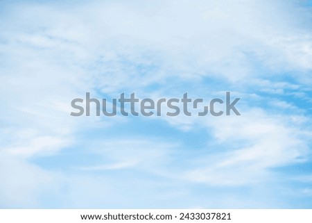 Stock photo of cirrus and stratus clouds in white and blue