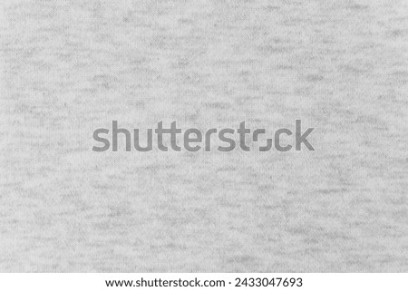 Light heather gray thick brushed cotton footer fabric texture. Soft knitwear textile background. Royalty-Free Stock Photo #2433047693