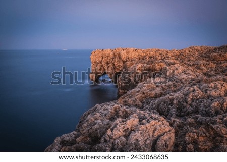 Water has dig the rock but it is light that sculpt an elephant. Italy, Sicily, June 2023. Long exposure picture.