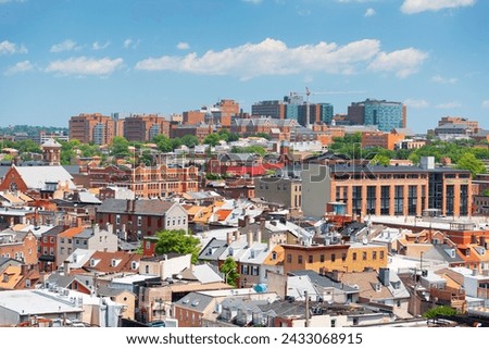 Baltimore, Maryland, USA cityscape overlooking little Italy and neighborhoods.
