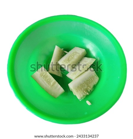 Picture of a cucumber on a plate.