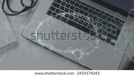 Image of shapes and digital brain over stethoscope and laptop. Global medicine and digital interface concept digitally generated image.