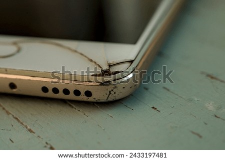 Close up of broken smartphone isolated