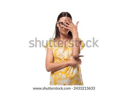 young European woman with glasses thinking about solving a problem