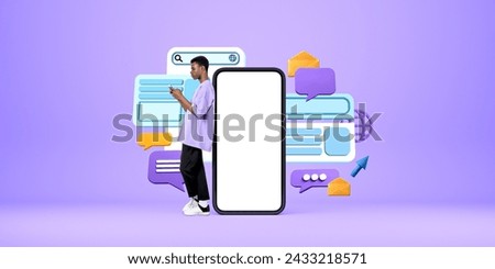 Black man standing near mock up smartphone, web bar search and speech bubbles with e-mails. Concept of digital communication, connection, website and mobile app