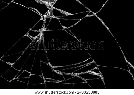 Close-up wrinkles and cracks on LCD screen glass display from smartphone, tablet or monitor other from smash and fall bumps with detail pattern background, for use as a pattern on tiles Royalty-Free Stock Photo #2433230883