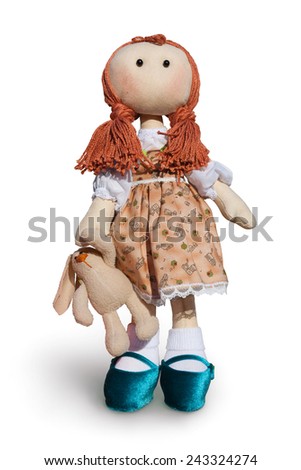 doll made of cloth with a little bunny 