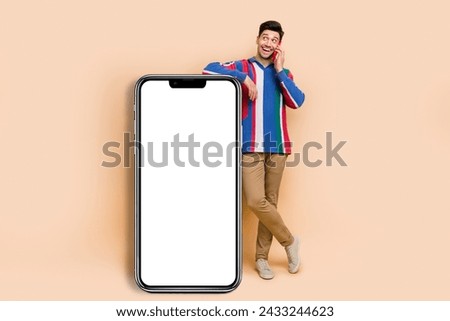 Full body size photo of satisfied person talking phone looking empty space interested in roaming service isolated on beige color background