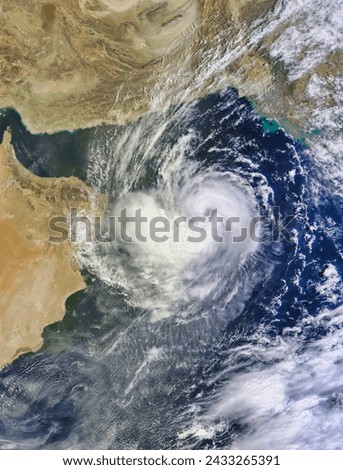 Tropical Cyclone Ashobaa 01A in the Arabian Sea. Tropical Cyclone Ashobaa 01A in the Arabian Sea. Elements of this image furnished by NASA. Royalty-Free Stock Photo #2433265391