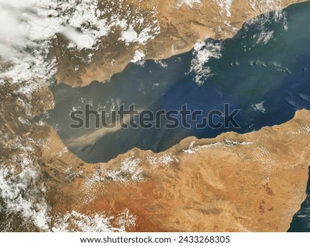 Dust Over the Gulf of Aden. . Elements of this image furnished by NASA. Royalty-Free Stock Photo #2433268305