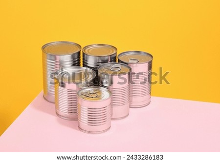 Concept of food stocks. Canned vegetables and different types of fish.