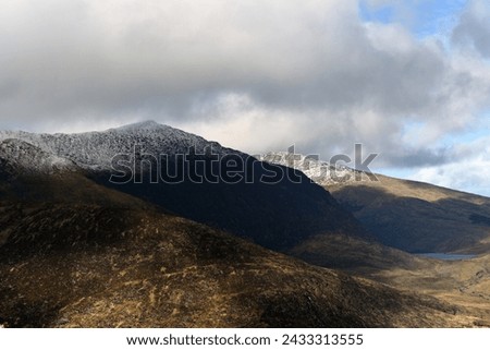 View from Conor Pass on a cold March day Royalty-Free Stock Photo #2433313555
