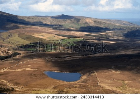 View from Conor Pass on a cold March day Royalty-Free Stock Photo #2433314413