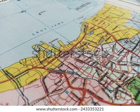 photo of the atlas map of DKI Jakarta Royalty-Free Stock Photo #2433353221