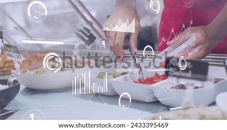 Image of data processing over biracial male shop assistant picking food. Global business and digital interface concept digitally generated image.