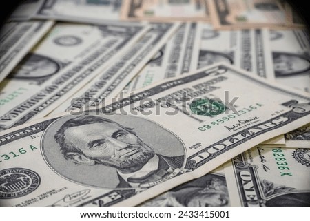 Macro view of US dollars bills with selective focus