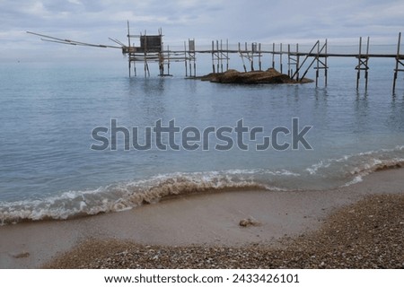  Punta Aderci Nature Reserve - Costa dei trabocchi - Abruzzo - The splendid trabucco (ancient fishing machine), an imposing building that extends over the sea. Royalty-Free Stock Photo #2433426101