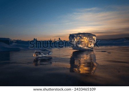 Ice of Lake Baikal, the deepest and largest freshwater lake by volume in the world, located in southern Siberia, Russia Royalty-Free Stock Photo #2433465109