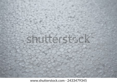 Texture photo of compressed white styrofoam background. Royalty-Free Stock Photo #2433479345