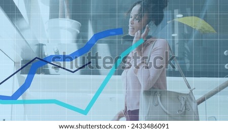 Image of data processing over african american businesswoman using smartphone. Global business and digital interface concept digitally generated image.