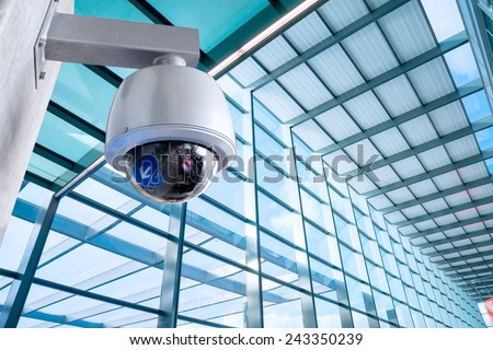 Security Camera, CCTV on location, airport Royalty-Free Stock Photo #243350239