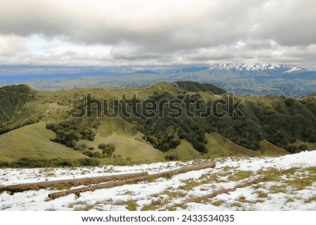 Snowfall in the hills of the Diablo Range in Northern California Royalty-Free Stock Photo #2433534035