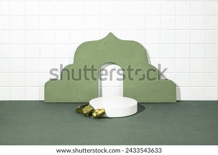 Realistic Islamic stage decoration, Iftar, Eid Mubarak text space and ramadan kareem podium with green vibes, with ketupat ornament.for product presentation sale offer and promotion empty Royalty-Free Stock Photo #2433543633