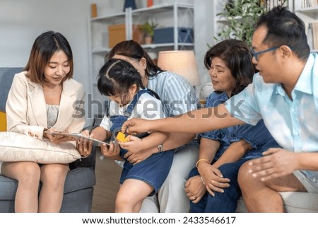 Real estate woman agent holding contract to buy and sell and life insurance to family for signature, consultant talk in house for sale.asian father signing contract.business and real estate concept