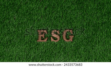 Environmental awareness campaign showcase message arranged in ESG on biophilic green grass background. Environmental social governance concept idea for sustainable and greener future. Gyre