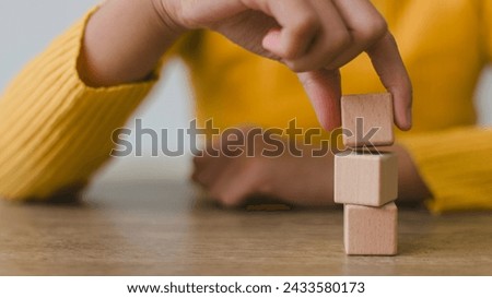 Blank wooden cubes on the table with copy space, empty wooden cubes for input wording, and an infographic icon