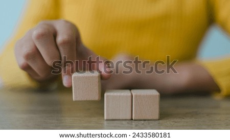 Blank wooden cubes on the table with copy space, empty wooden cubes for input wording, and an infographic icon