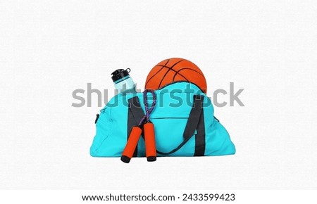 Bag with sportswear, equipment and shoes on white background. copy space for text. isolated on white Royalty-Free Stock Photo #2433599423