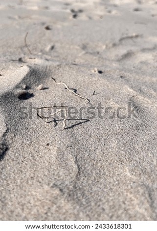 Crisp white sand in sun