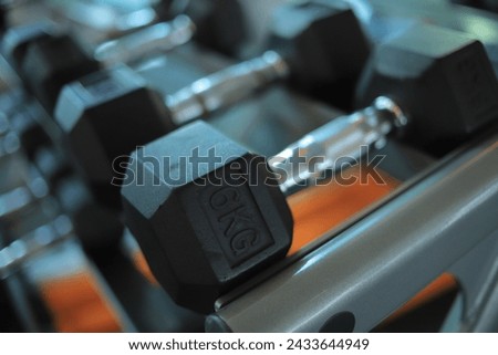 Close up of dumbbell at gym Royalty-Free Stock Photo #2433644949