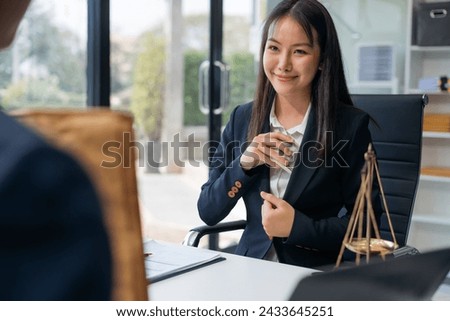Business woman offer cost of hundred dollars. Hands close up Venality, bribes, fraud concept hand give money - United States dollars, hand get paid by businessman. Royalty-Free Stock Photo #2433645251
