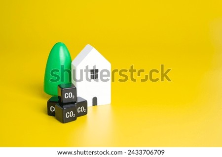 CO2 metric cubes made by the household during the year. Adopting sustainable practices. Reduce energy consumption and associated CO2 emissions. Contribute to a cleaner environment Royalty-Free Stock Photo #2433706709
