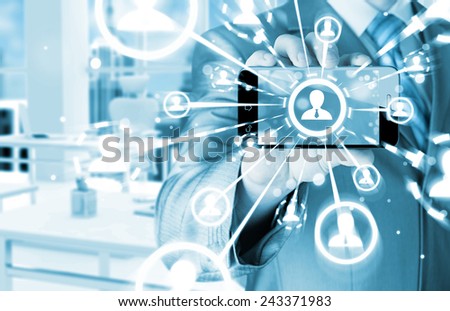 Business Hand holding a phone show the social network