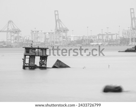 Shipwrecked at sea. Long exposure photography.