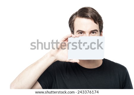 Young man cover his face with business card