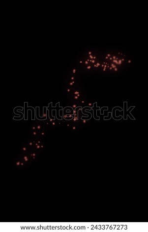 Black Background Stock Image Featuring Luminous Particles, Abstract Festive Christmas Texture with Golden Bokeh Particles and Highlights. High-resolution Photograph.