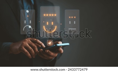 Businessman choosing on the happy Smile face, positive mindset selection. Customer service and Satisfaction concept, review, feedback, the best quality, Mental health and emotional state concept. Royalty-Free Stock Photo #2433772479